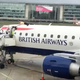 James Brown, a Paralympian who is visually impaired, delays a flight by climbing atop the plane at London City Airport on Thursday, October 10, 2019.